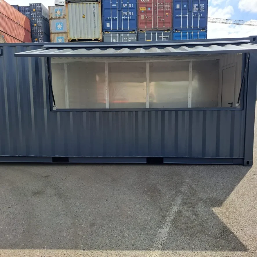 Container kaufen: dunkelgrauer Bar-Container mit Klappdach und Seitentür, bereit für Events